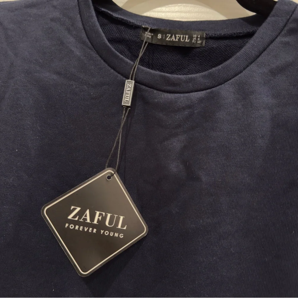 Navy Blue Pullover Sweatshirt with Rainbow Striped Ribbon Panels on the Arms NWT - Picture 13 of 14